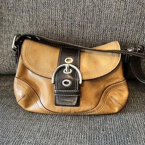 Small tan coach bag
